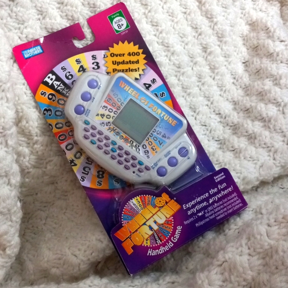Hasbro/Parker Brothers Gaming Wheel of Fortune Handheld Electronic Game